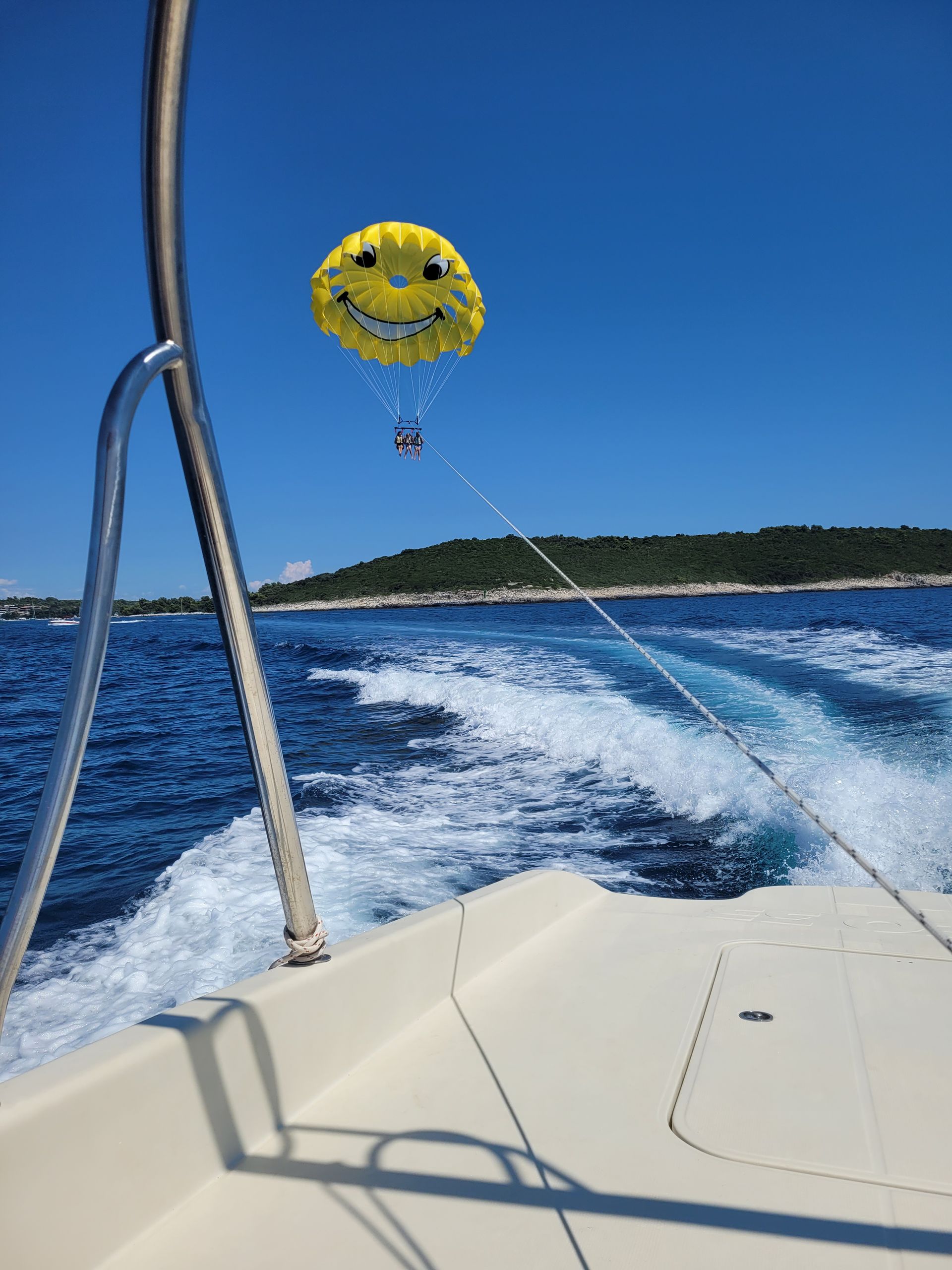 Parasailing takeoff from boat in Rovinj, Istria