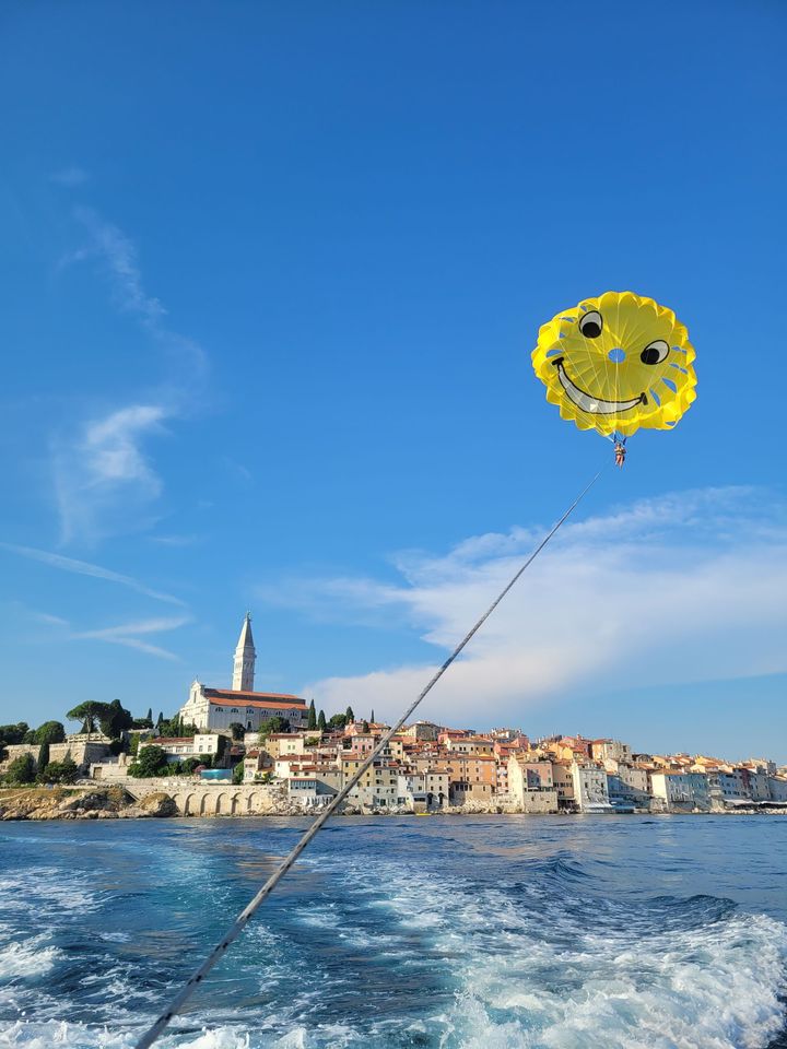 Parasailing flight over Rovinj old town from ACI Marina