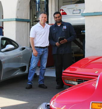 Men Standing Next to a Ferrari in Laguna Beach, CA - Laguna Auto Service Center