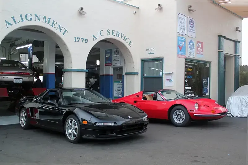 Two Cars Parked in Front of Our Service in Laguna Beach, CA - Laguna Auto Service Center