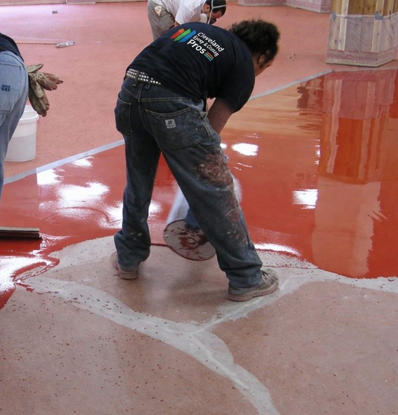 cleveland epoxy and coating pros contractor doing a floor coating install in parma