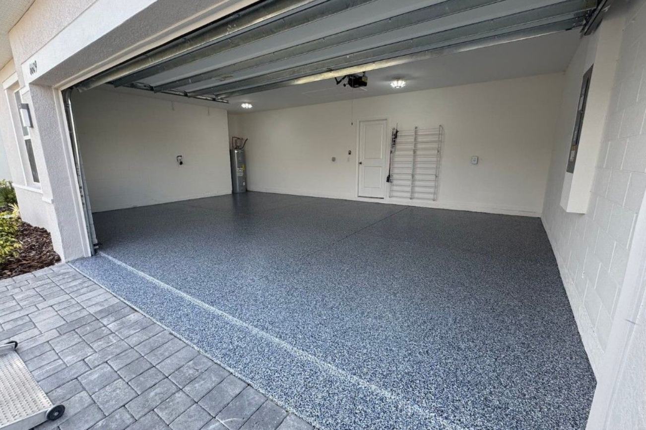 Exotic, decorative broze and black coated garage floor with metallic epoxy on concrete.
