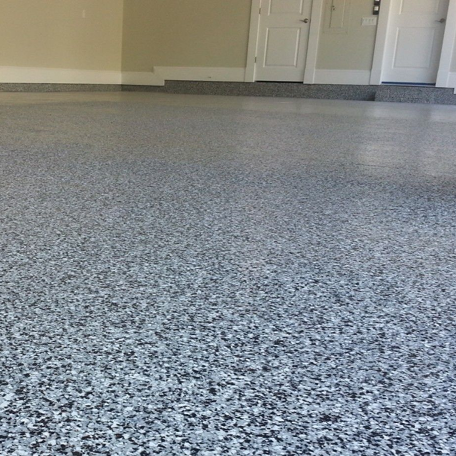 Medina flake floor Flake garage floor coating installed in a residential garage in Medina, Ohio.