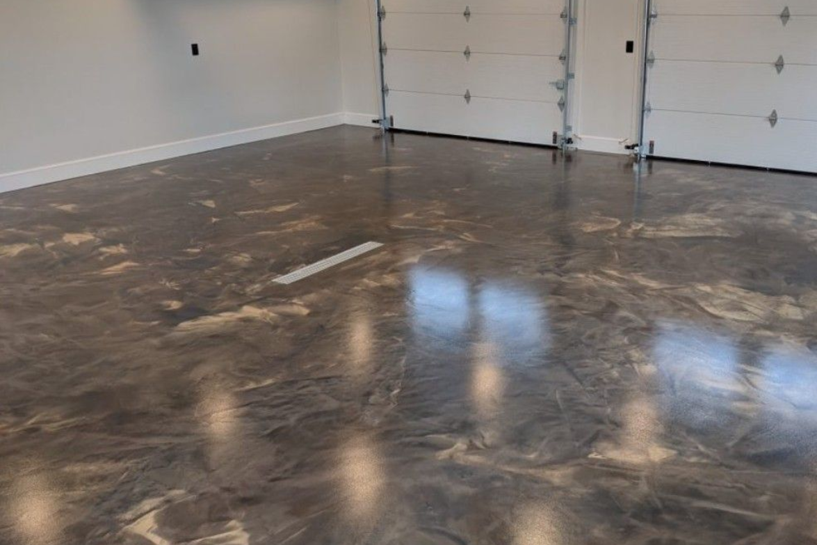 Exotic, decorative broze and black coated garage floor with metallic epoxy on concrete.