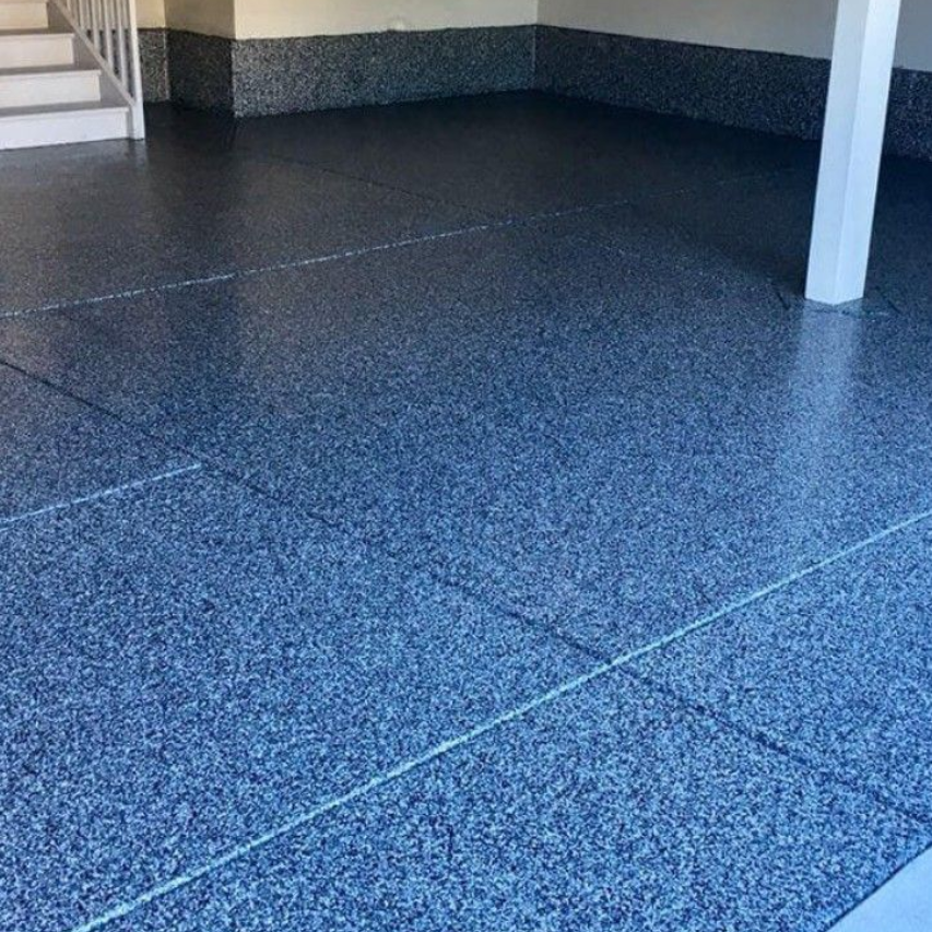 Westlake garage floor Flake garage floor coating installed in a residential garage in Westlake, Ohio.