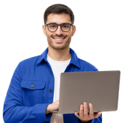 Smiling person in a blue jacket holding a laptop against a white background