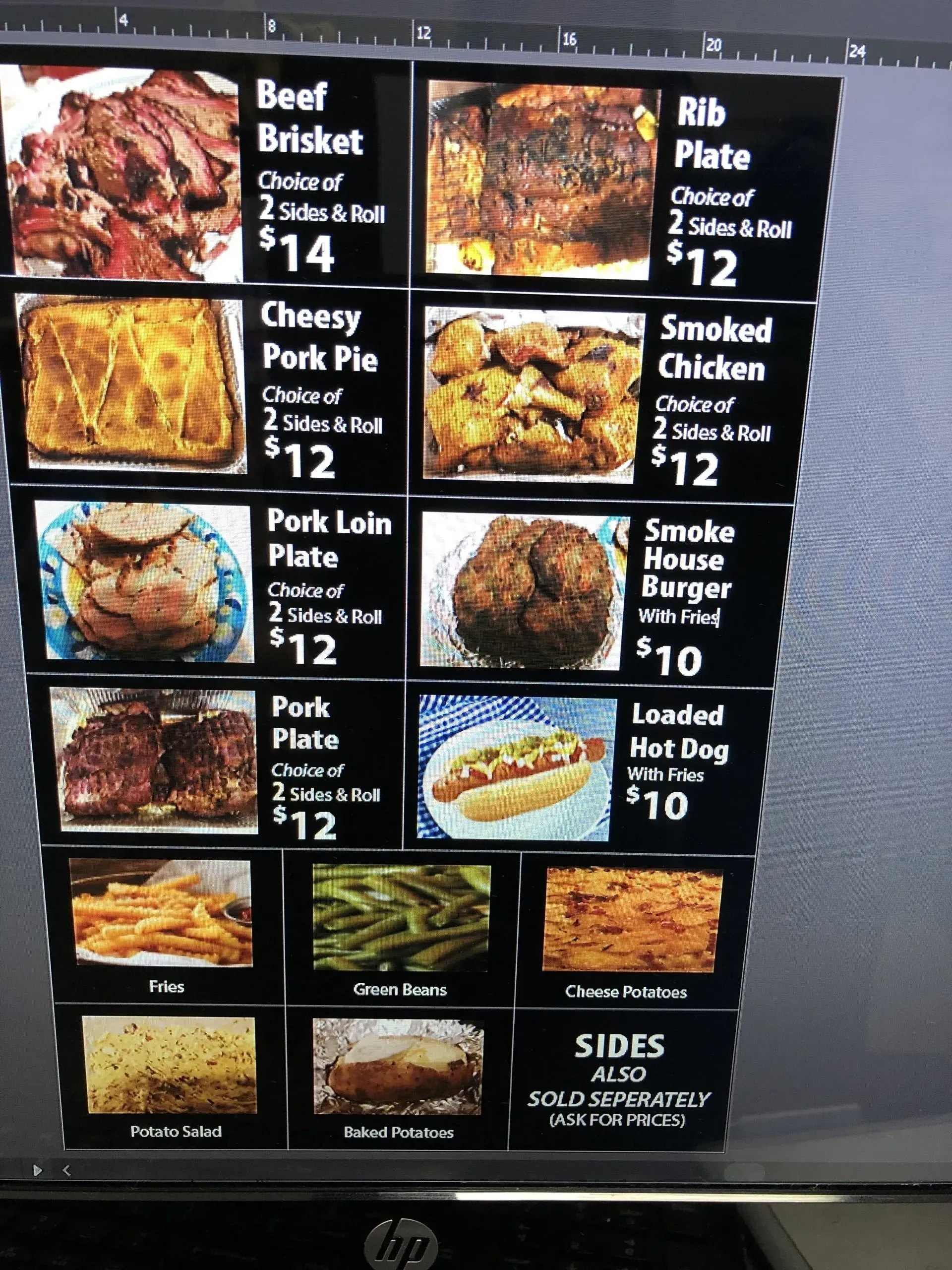 A computer screen shows a menu for a restaurant including beef brisket and smoked chicken