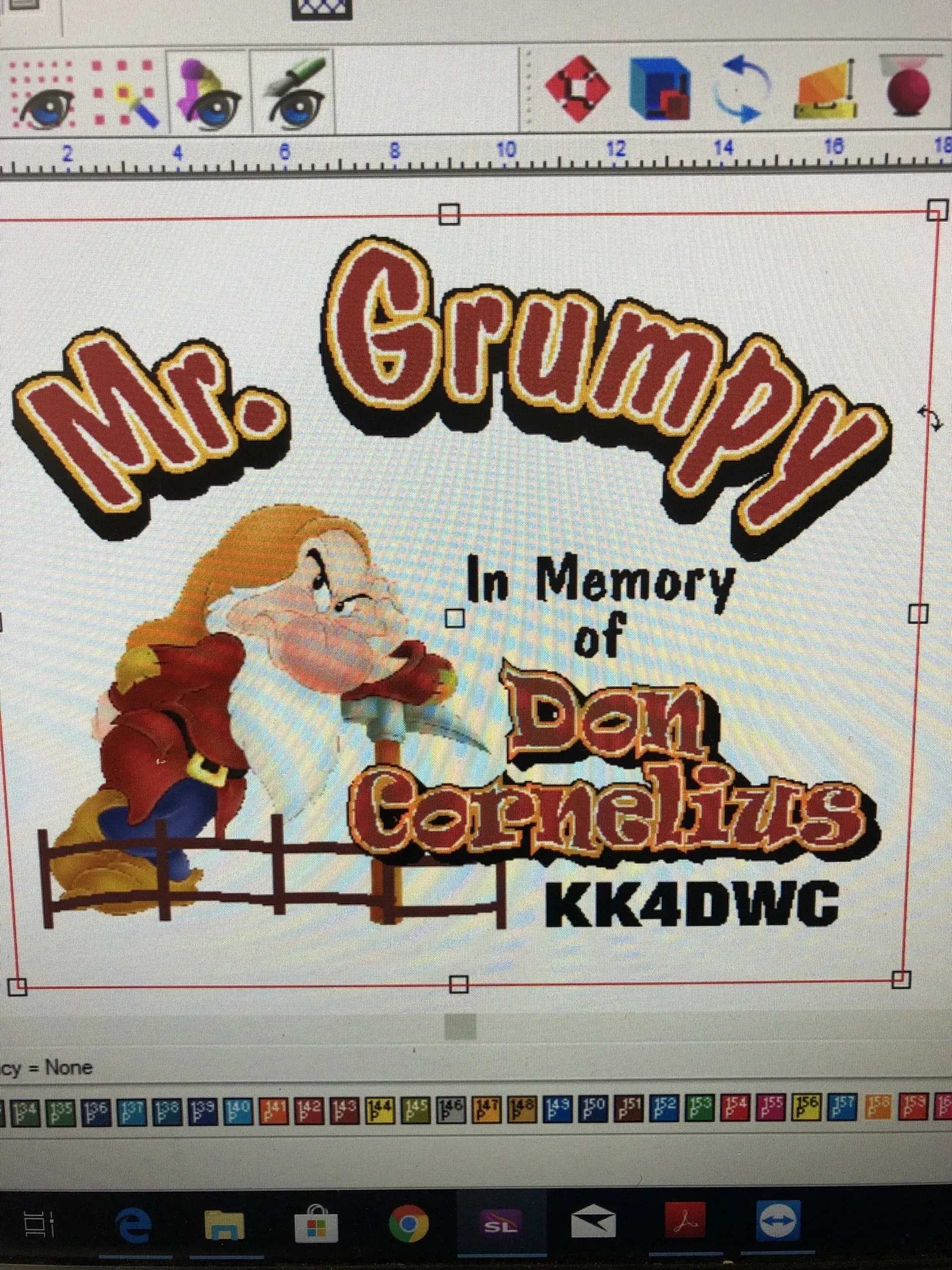 A computer screen shows a picture of mr. grumpy