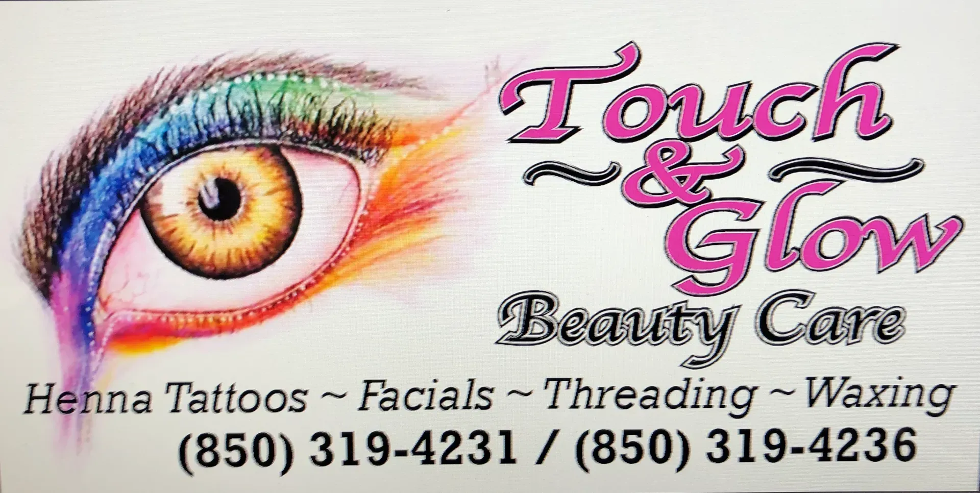 A sign for touch and glow beauty care shows a woman 's eye