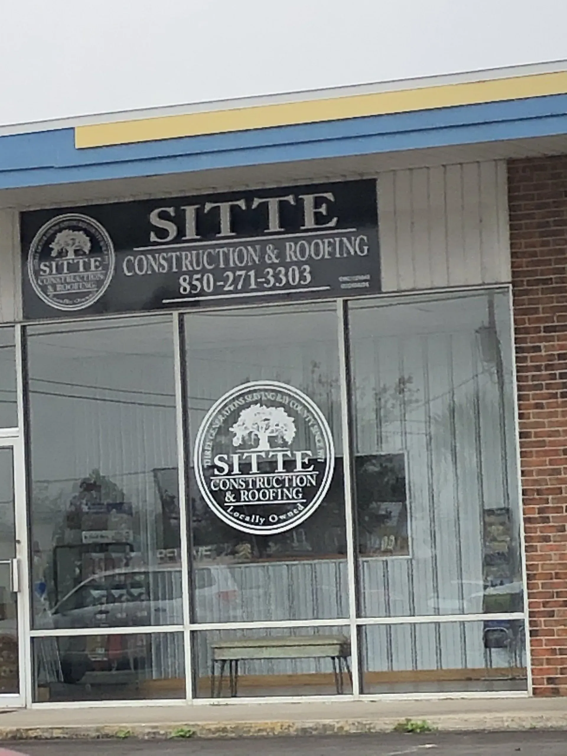 A store front for sitte construction and roofing