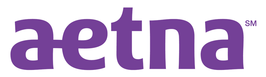 A purple aetna logo on a white background
