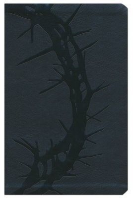 A black book with a crown of thorns on the cover.