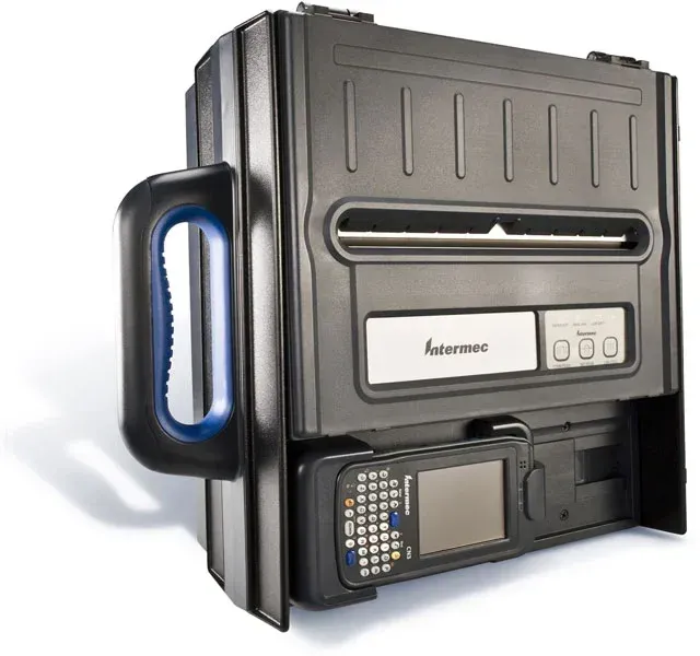 Black, boxy portable device with screen, keypad, and blue handle on a white background
