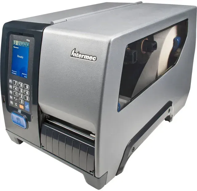 Gray industrial label printer with blue touchscreen and side label roll compartment