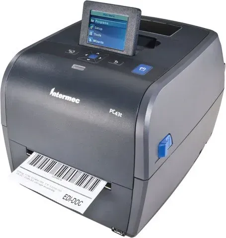Black Intermec label printer printing a barcode label with a small touchscreen display