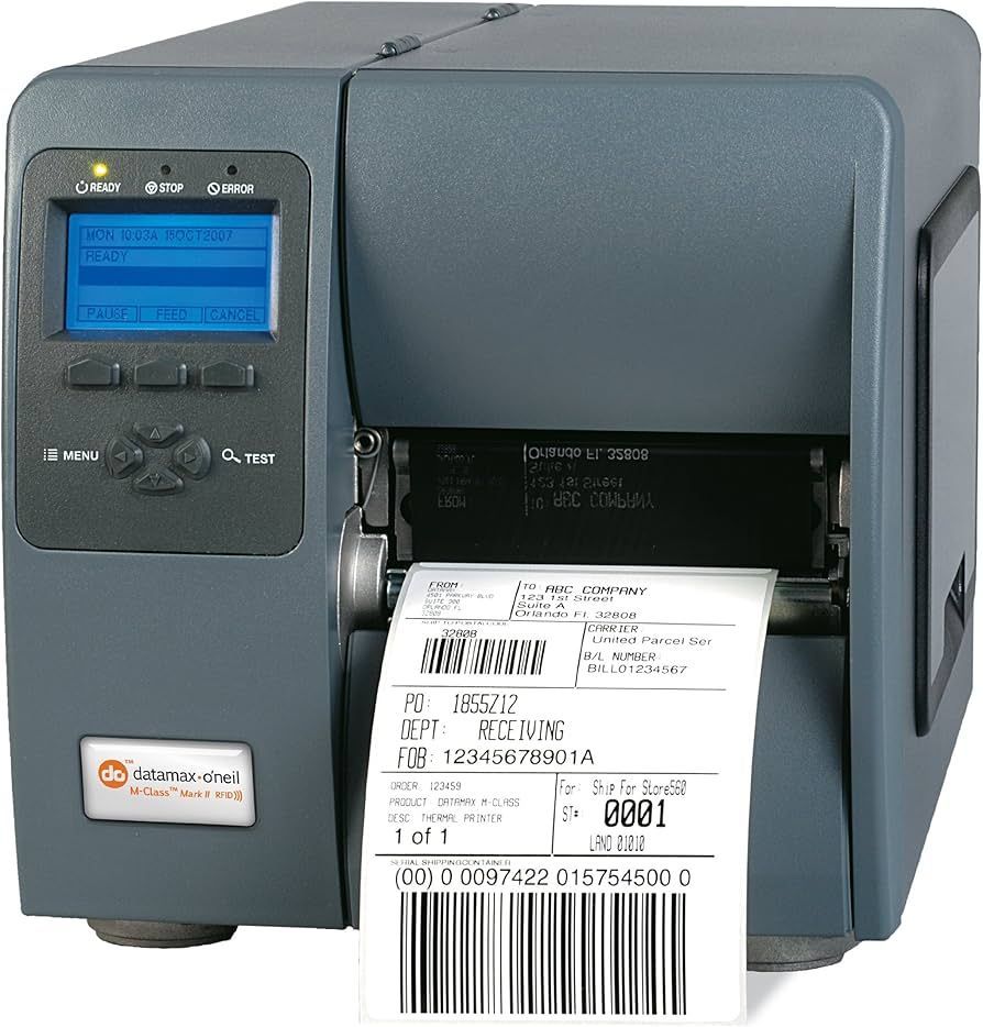 Gray label printer printing a shipping label with barcode and text