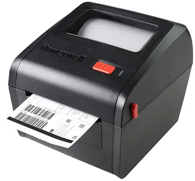 Black desktop receipt printer printing a barcode label from the front slot