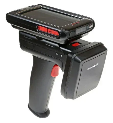 Handheld Honeywell barcode scanner with attached black battery pack on a white background