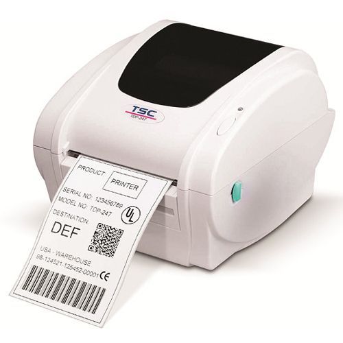 White label printer printing a shipping label with barcode and QR code