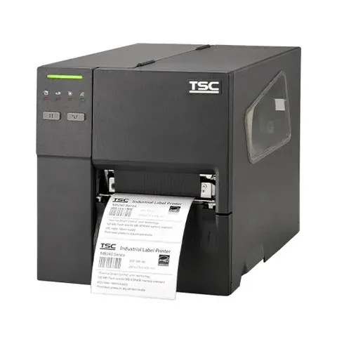 Black TSC label printer printing a shipping label on a white sheet