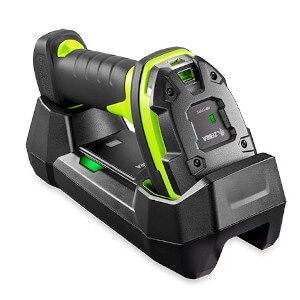 Black and neon green handheld scanner docked in a charging cradle