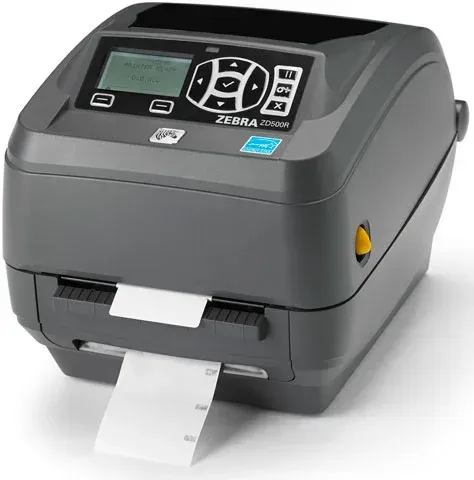 Gray Zebra label printer with a label feeding out of the front.