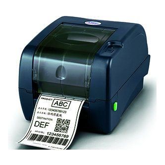 Blue desktop label printer printing a barcode shipping label on white paper