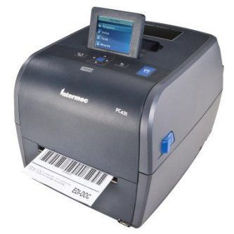Desktop label printer with touchscreen display, printing a barcode label on a white roll