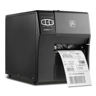 Black desktop label printer printing a barcode shipping label
