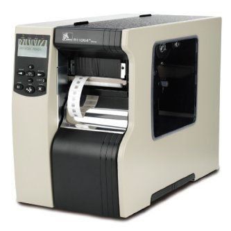 Desktop label printer printing a roll of labels, cream and black корпус with front display window