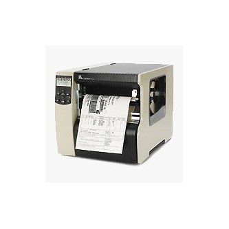 Industrial label printer printing a shipping label, beige and black корпус on white background