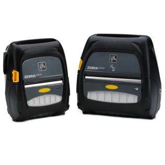 Two black Zebra label printers side by side, one smaller and one larger, with yellow buttons.
