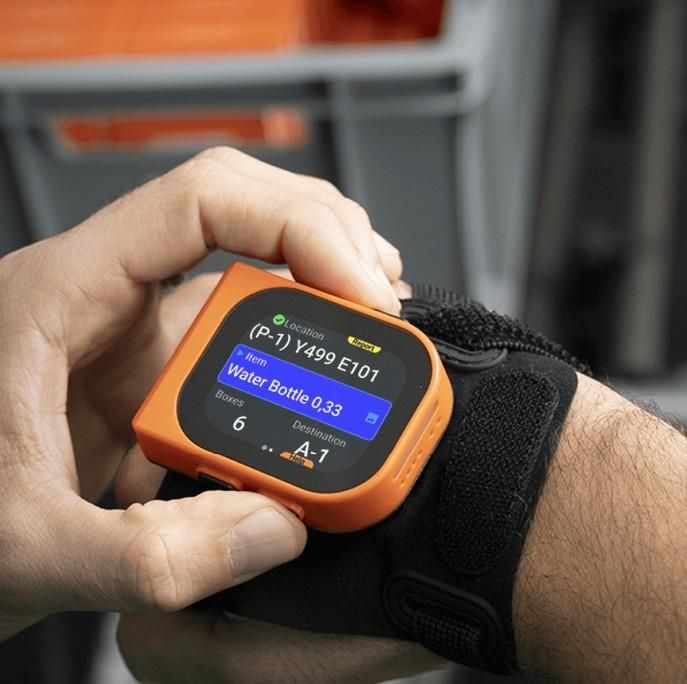 Warehouse worker using ProGlove MAI wearable barcode scanner