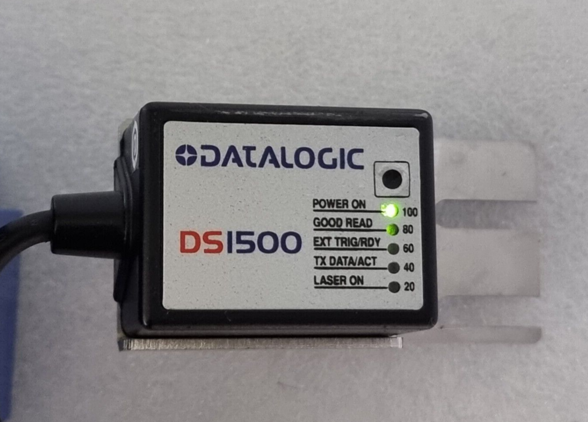 Datalogic DS1500 sensor with status LEDs on a gray surface