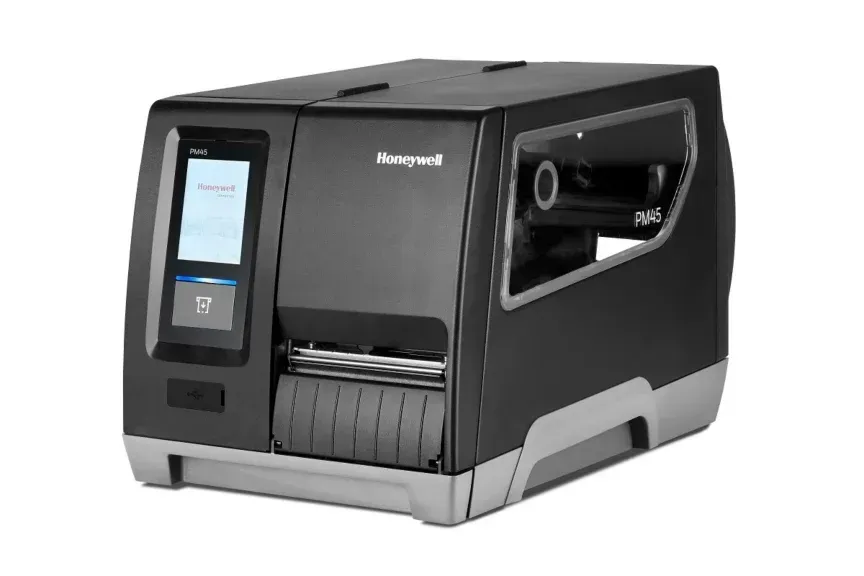 Black desktop label printer with touchscreen and output tray, shown on a white background