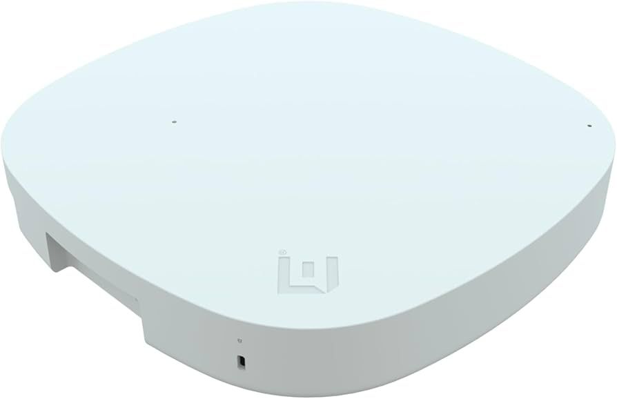 White rounded square electronic device with a small front indicator on a plain background