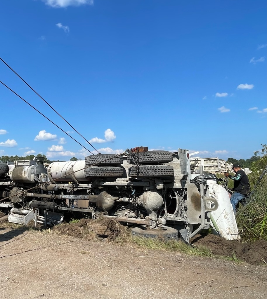 A truck that has fallen over on its side