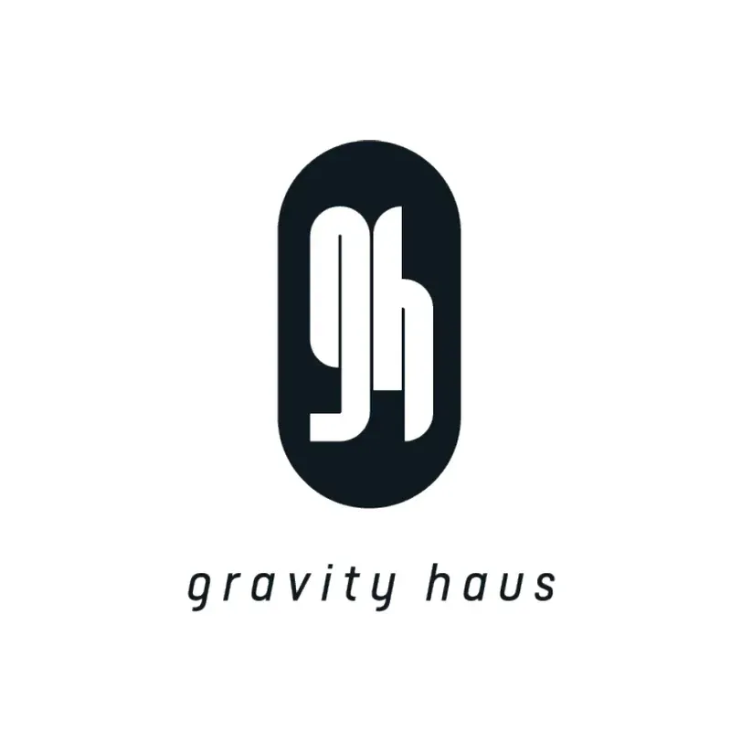 Black-and-white Gravity Haus logo with stylized “gh” in a rounded vertical icon