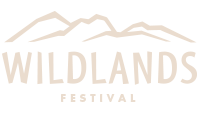Wildlands Festival logo with beige mountain outline and text on white background