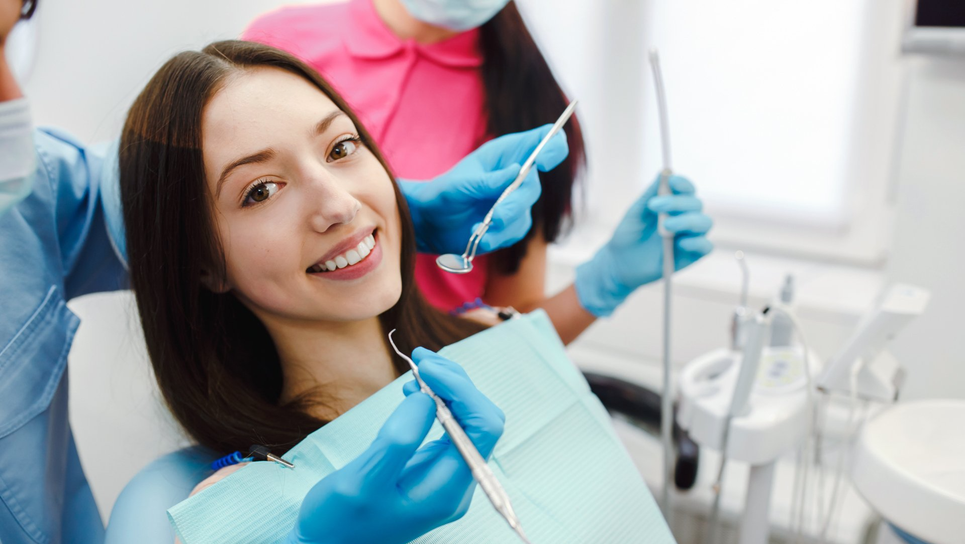 Woman in dental chair for dental exam | Same Day Implants in St. Louis MO
