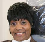 Image of a woman before treatment | Dental veneers in Osborne, KS to repair and reshape teeth.