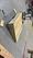 Wooden workout box and gym equipment on a concrete floor in a warehouse-style gym