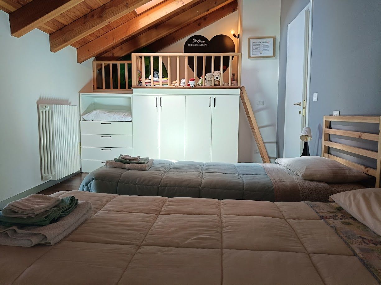 Chambres doubles avec espace de jeux pour enfants