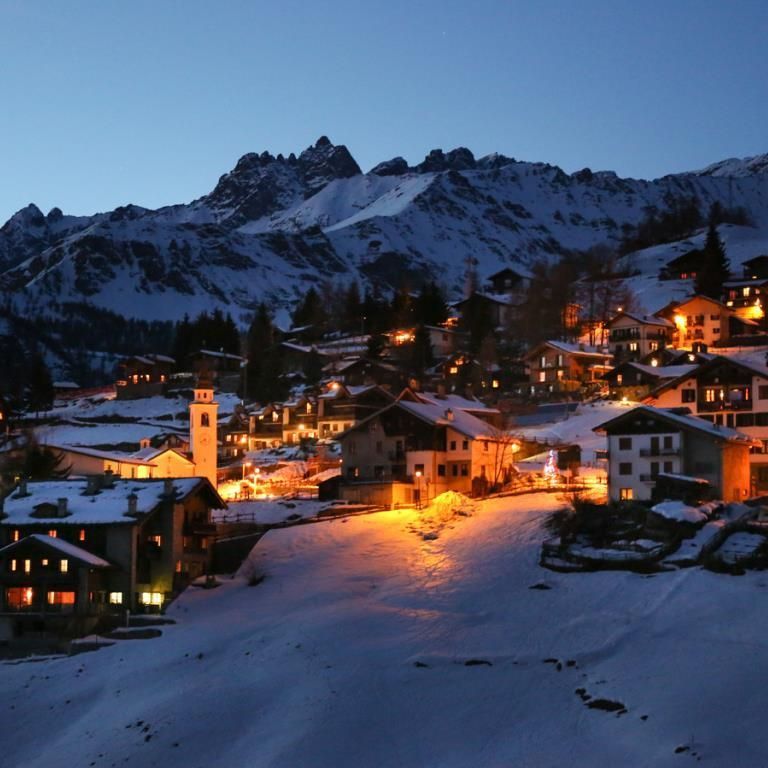 Traditional alpine village of Chamois in winter, accessible only by cable car