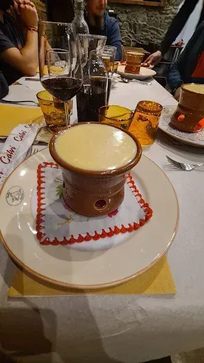 Fonduta valdostana cremosa servita alla Locanda Il Cervino, specialità tipica della Valle d’Aosta