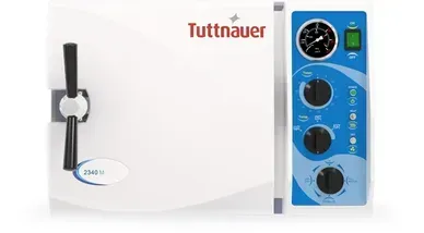 A white oven with a blue control panel and a handle.