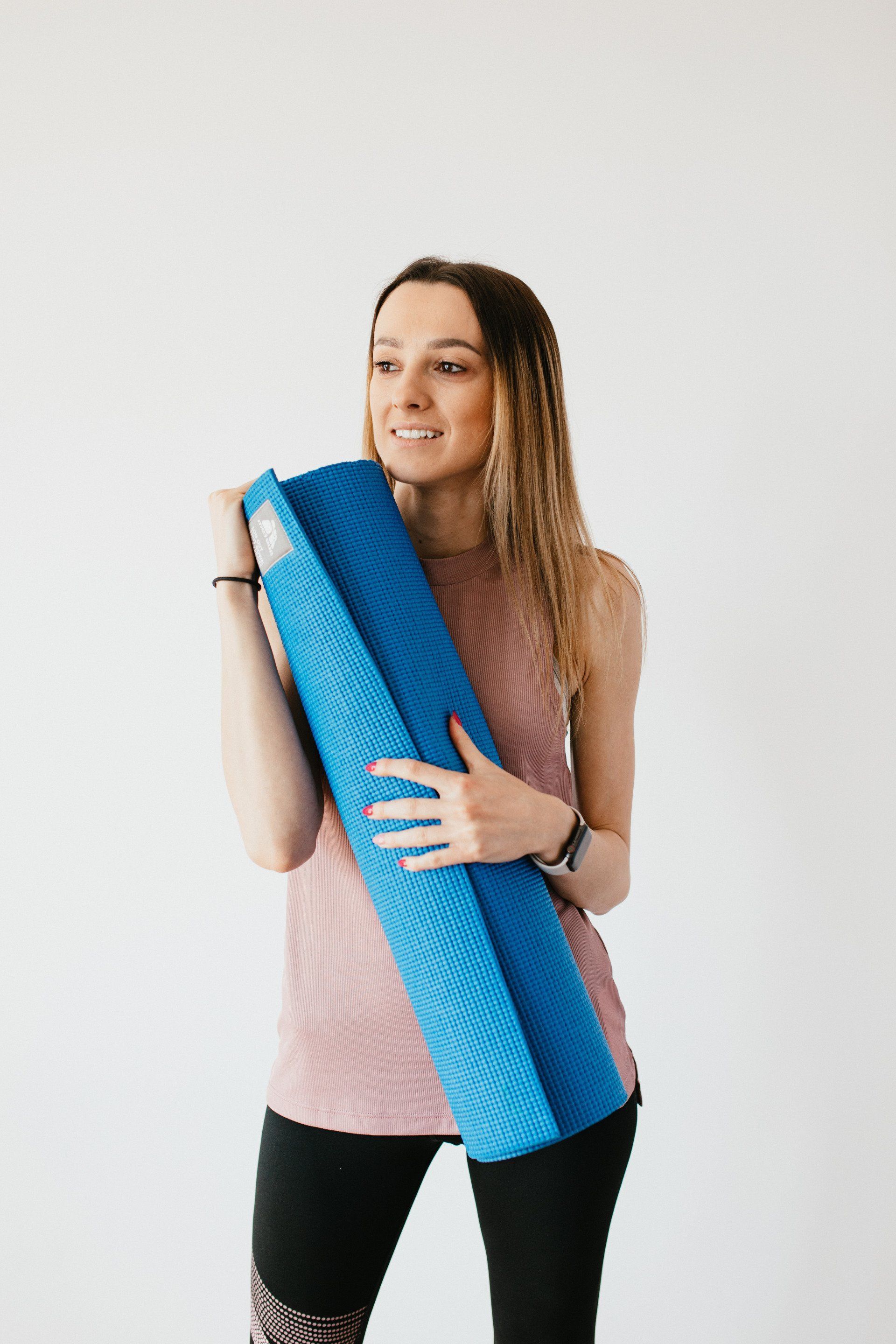 woman with yoga mat