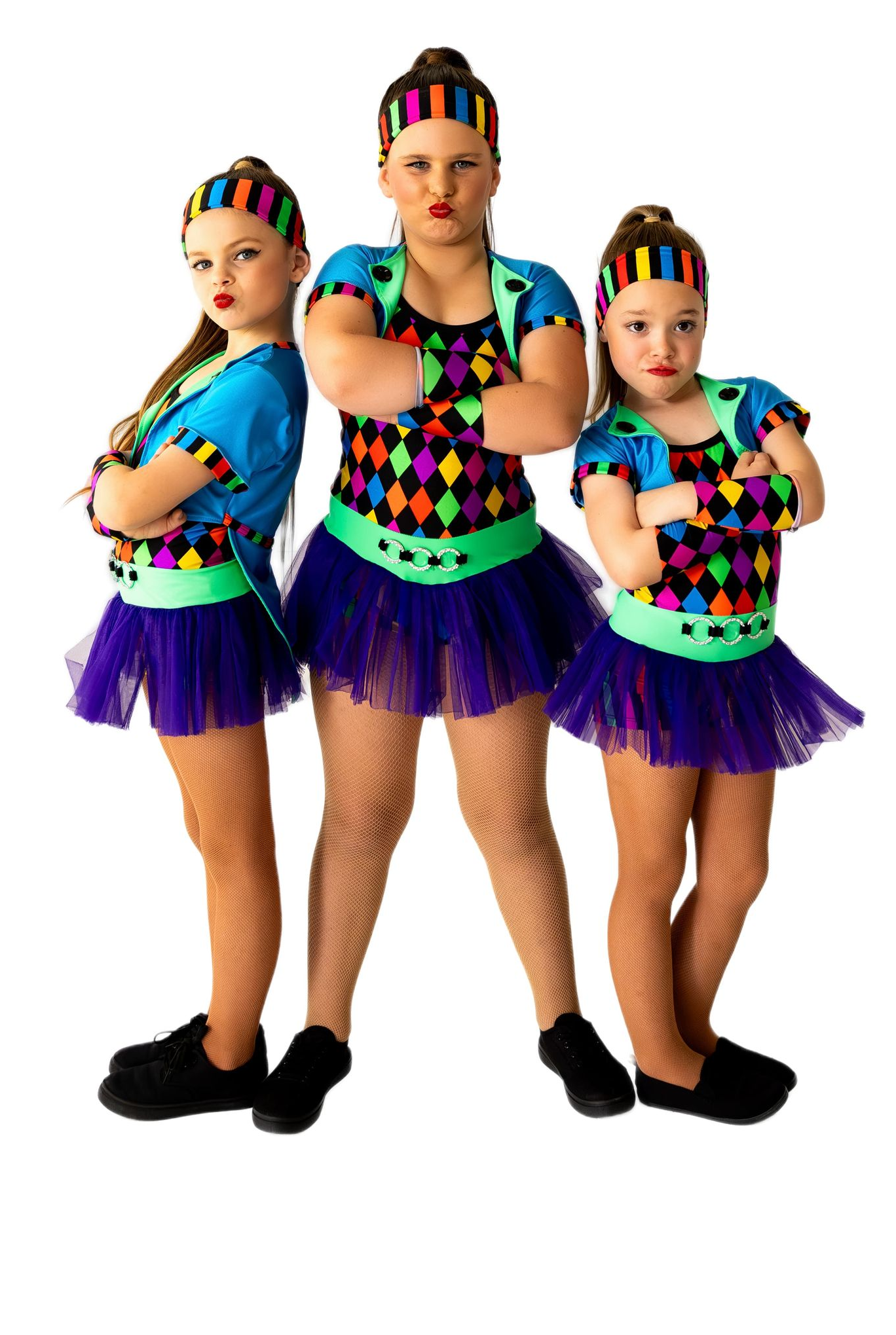 Three Dancers in Colourful Costumes With Arms Crossed, Posing Confidently — iDance Performance Co In Medowie, NSW