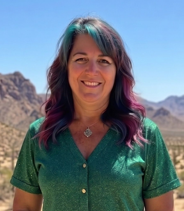 Mary Ellen Cavanagh, founder of The kAIzen Alliance, smiling outdoors against an Arizona desert landscape