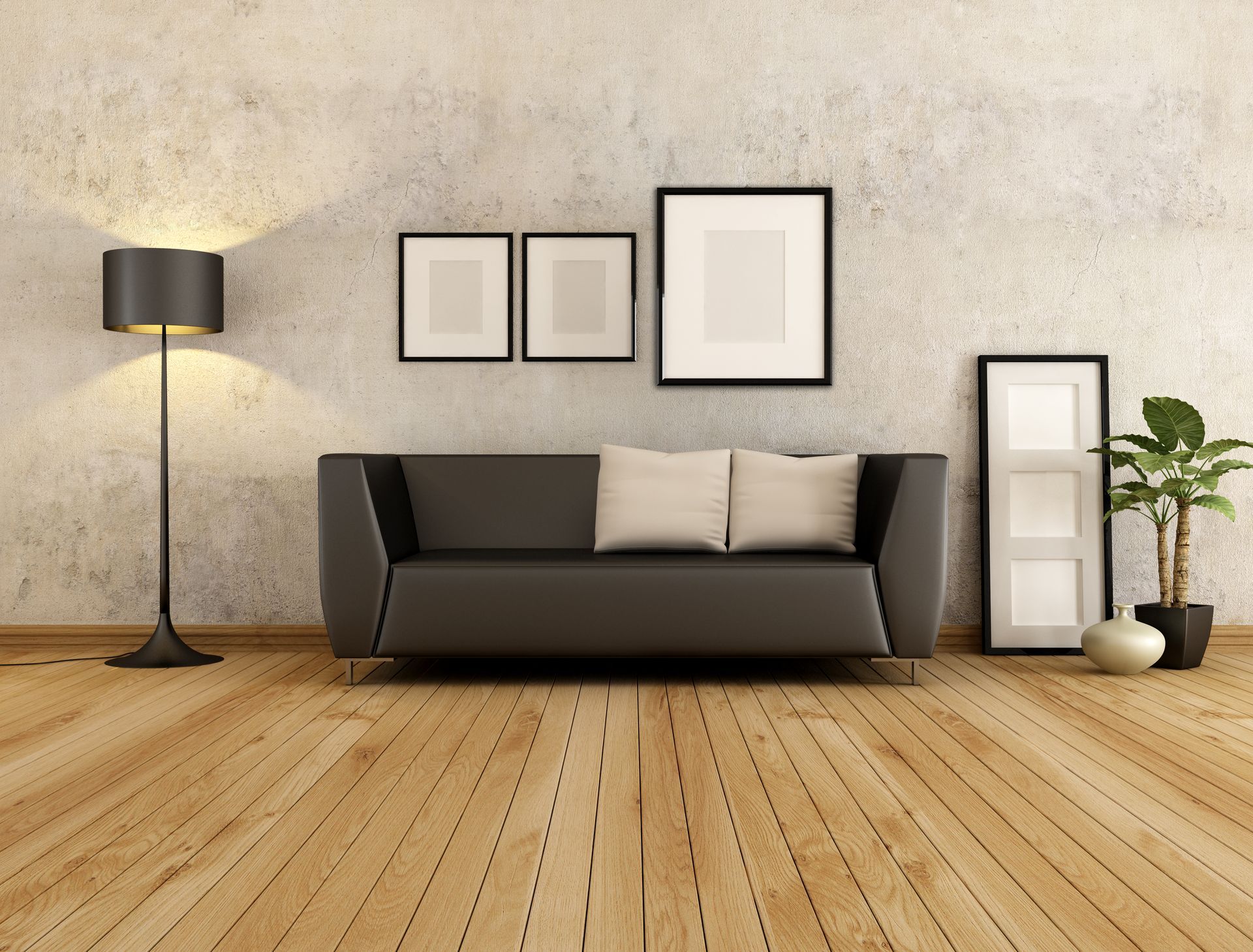 Modern living room showcasing hardwood flooring with dark brown sofa and stylish decor.